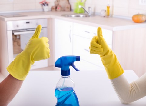 Technician preparing carpet cleaning equipment before work